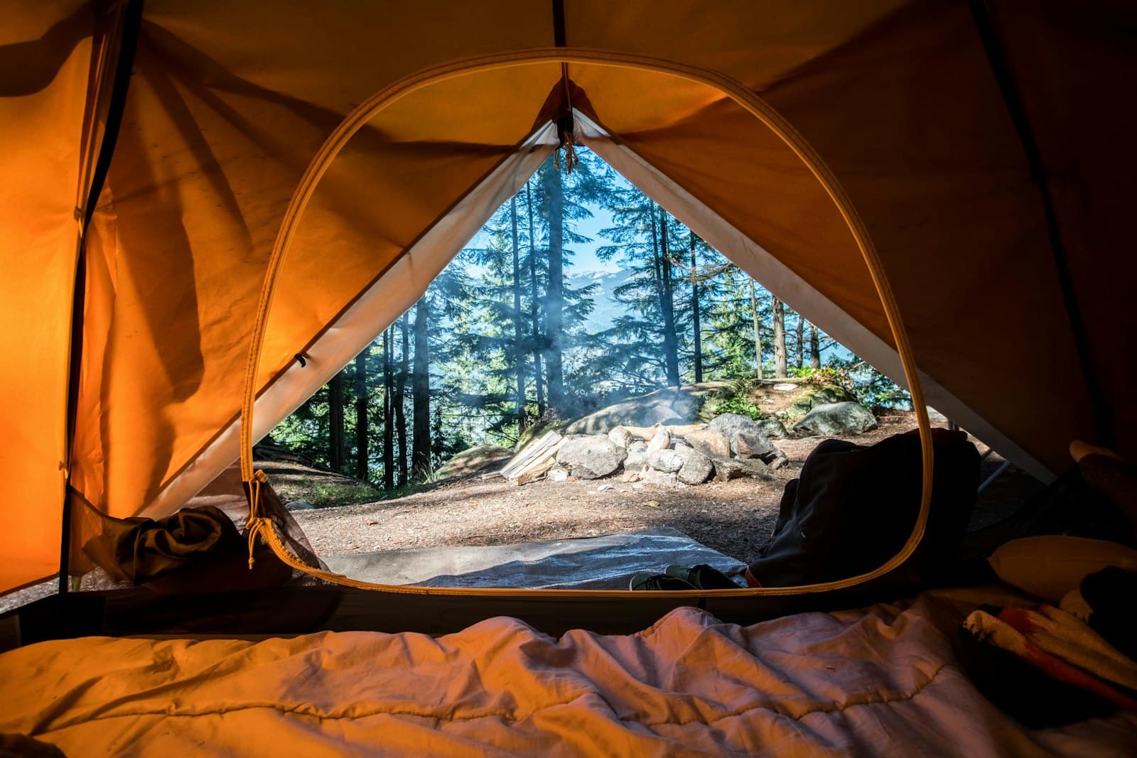 Safari tents on a grassy plain, standing in for Chemi Chemi accommodation
