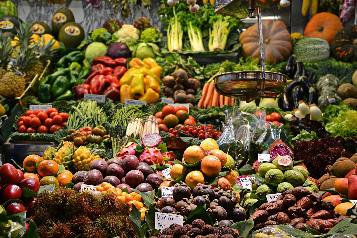 Open-air market produce, standing in for livelihood and economic training